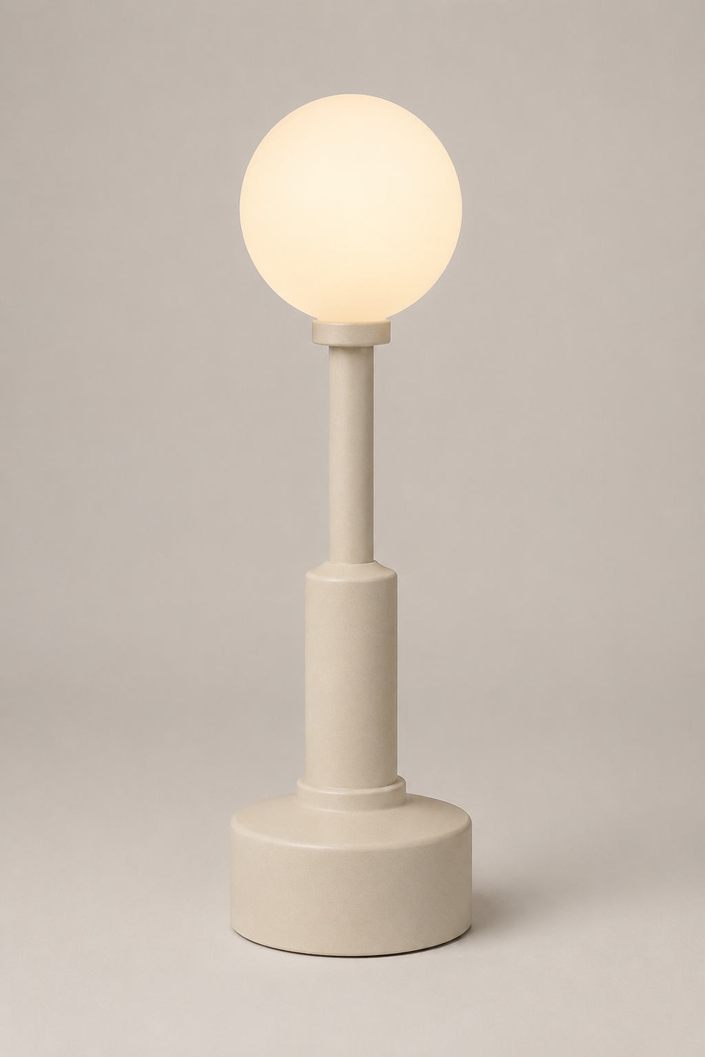 Archie portable light in matte ivory.
