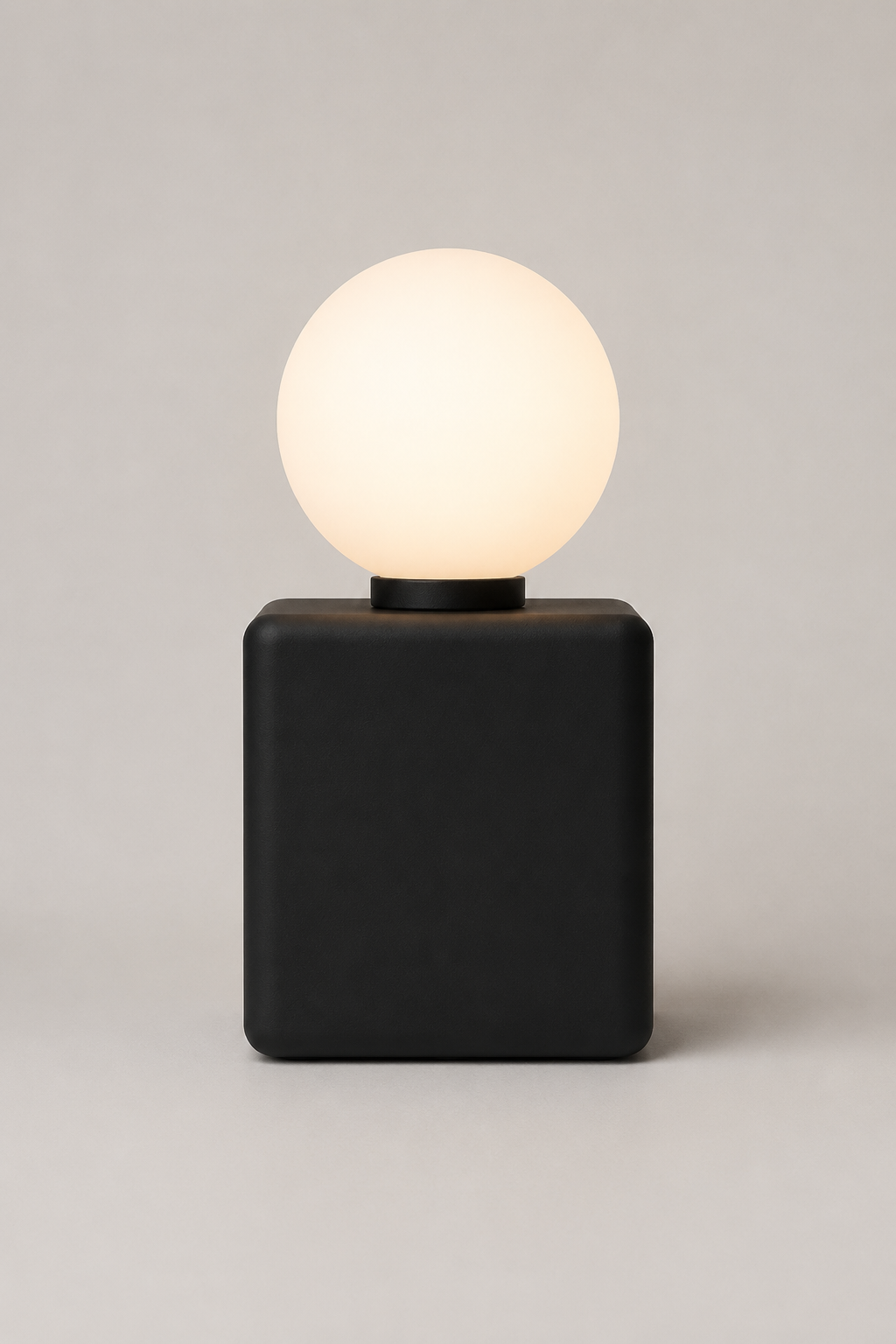 Cubit Matte Ebony portable light, Call Me Anthony design.