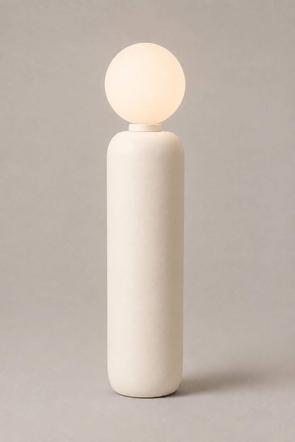 Torre portable light in matte ivory.
