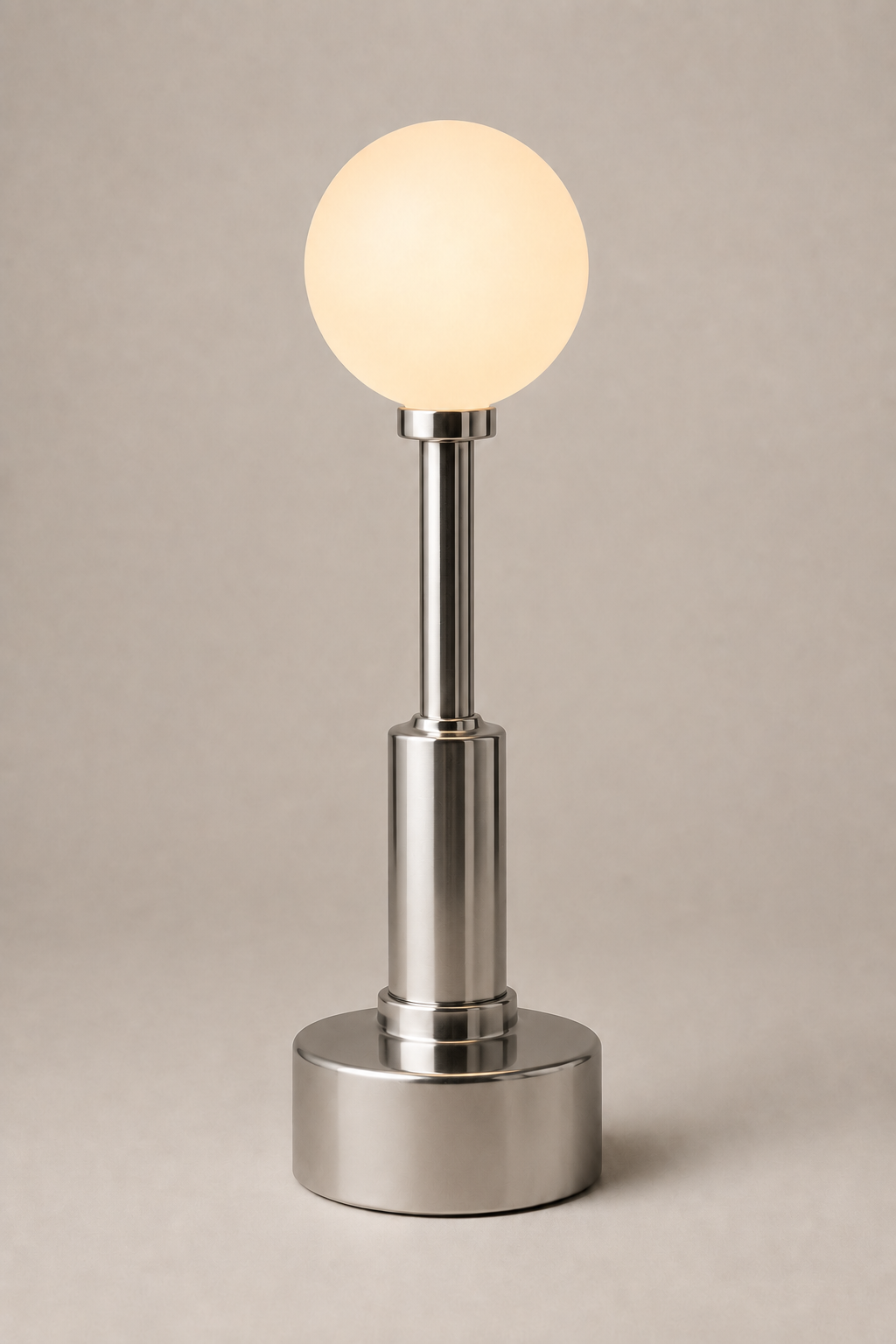 Archie Polished Stainless portable light, Call Me Anthony design.