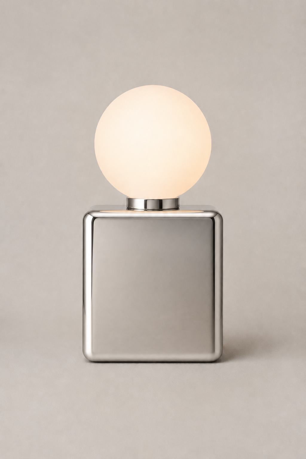 Cubit portable light in polished stainless, an original Call Me Anthony design.